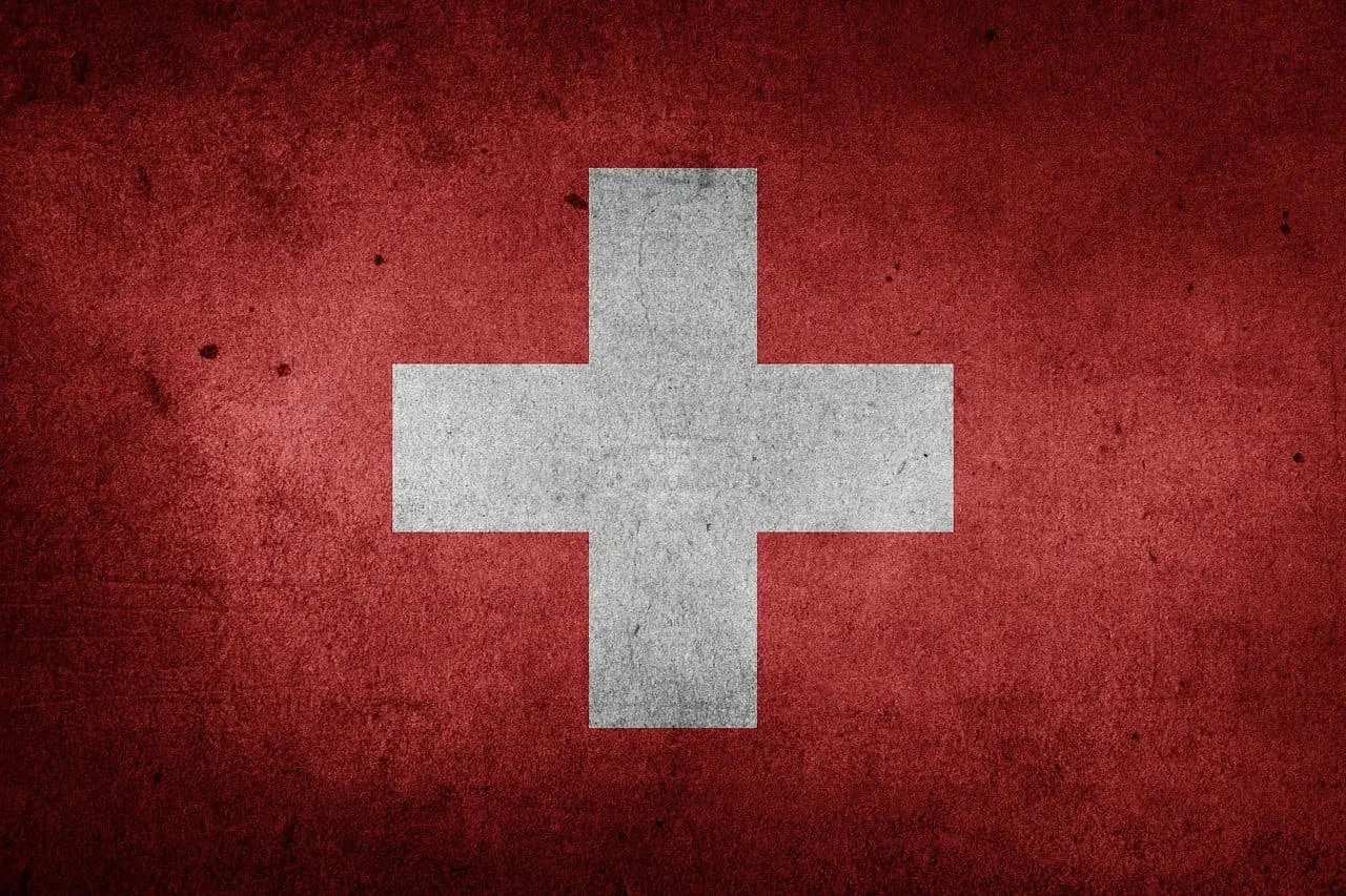 Herencia en Suiza, aparecde la bandera de suiza, cruz blanca con el fondo rojo